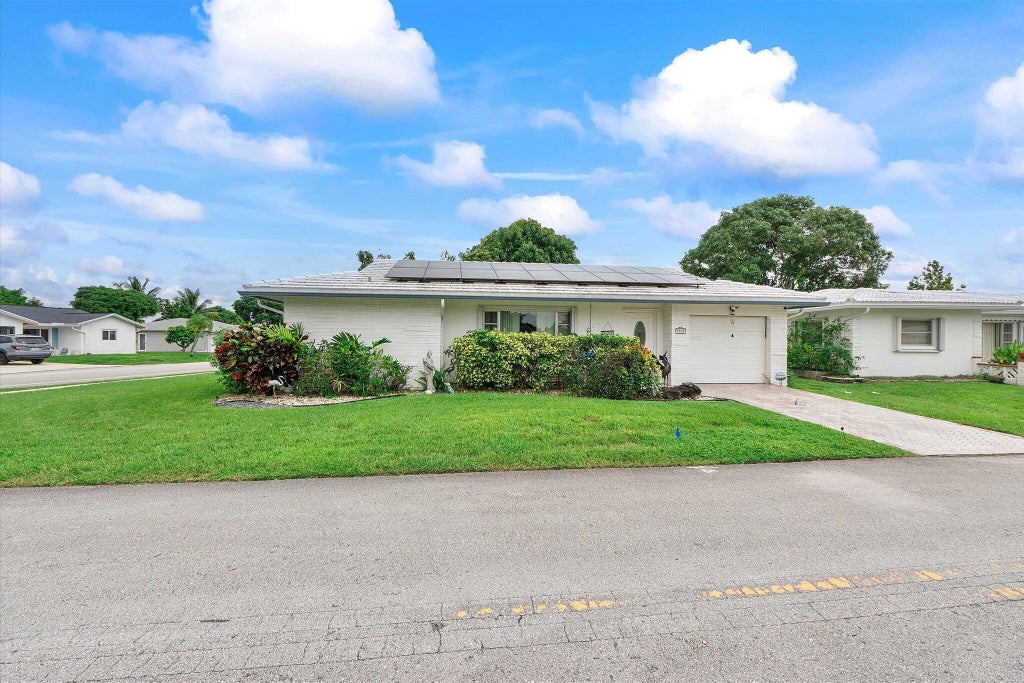 Photo of 7510 NW 71st Avenue, Tamarac, FL 33321 (MLS # B26085317)