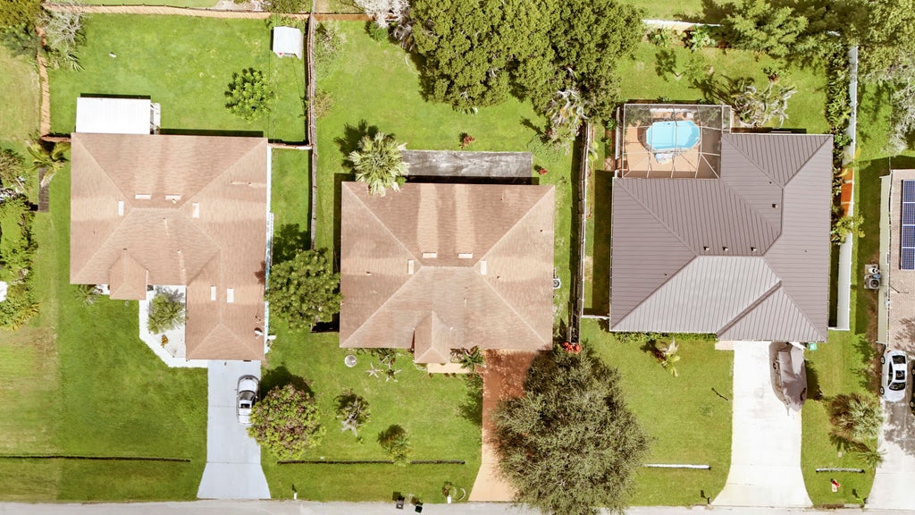 Photo of 825 SE Cavern Avenue, Port Saint Lucie, FL 34983 (MLS # B26075586)