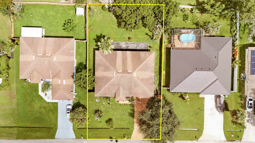 Photo of 825 SE Cavern Avenue, Port Saint Lucie, FL 34983 (MLS # B26075586)