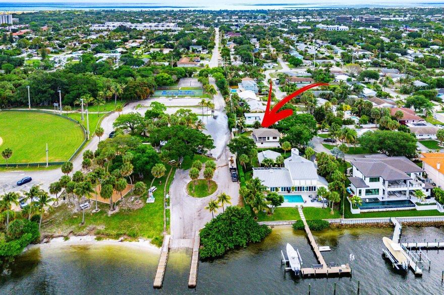 RARE OPPORTUNITY in North Palm Beach with this spacious 4-bedroom, 4-bathroom home offering 2,664 square feet of flexible living space. This single-family residence is uniquely ZONED AS A DUPLEX and can easily be converted into two separate 2-bedroom 2-bath units, presenting an exceptional option for multi-generational living, rental income potential, or a smart long-term investment. With no HOA restrictions or fees, you'll enjoy added flexibility and freedom. The property has been thoughtfully improved with a new drainfield and new brick pavers in both driveways for enhanced curb appeal and functionality. Inside, the upgraded main kitchen is perfect for everyday living and entertaining, while the updated bathrooms add comfort and style. Ideally located next door to Juno Park, outdoor recreation is right at your doorstep. Enjoy direct access to the Intracoastal boat ramp, launch your kayak or paddleboard, or spend the day at the park. The beach is just a short bike ride away, allowing you to enjoy the best of the coastal lifestyle whenever you choose. Whether you're searching for a primary residence, income-producing property, or a home with room for extended family, this unique North Palm Beach property offers location, lifestyle, and incredible potential all in one.