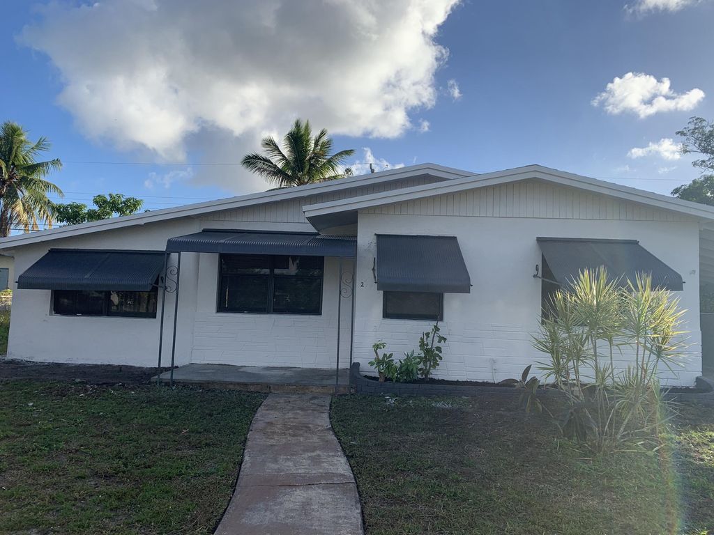 Photo of 2740 NW 16th Street, Fort Lauderdale, FL 33311 (MLS # R10854873)
