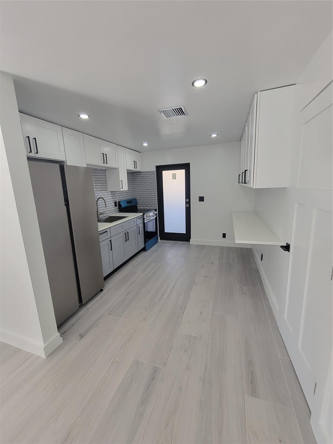 Completely and Beautifully renovated 2-BED, 1-BATH home. Living here will be like living in a new home in a prime location! SITUATED JUST MINUTES FROM LAS OLAS, DOWNTOWN FORT LAUDERDALE, BEACHES, DINING, AND MAJOR ROADWAYS. easy rapid approval. And easy to see.
This property is new from flooring to ceiling lights. New appliances, cabinets in kitchen and bathroom, washer and dryer, recessed lighting throughout, New outlets and switches, ceiling fans, etc...