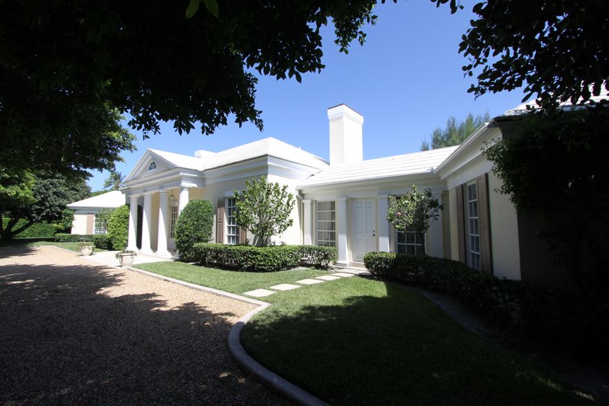 Unique opportunity to own nearly a double lot complete with a tennis court and an above garage guest suite. This 4 bedroom, 41/2 bath pool home offers complete privacy. Split floor plan with wrap around pool views. High ceilings throughout. Located in an oceanfront, golf and yachting community.