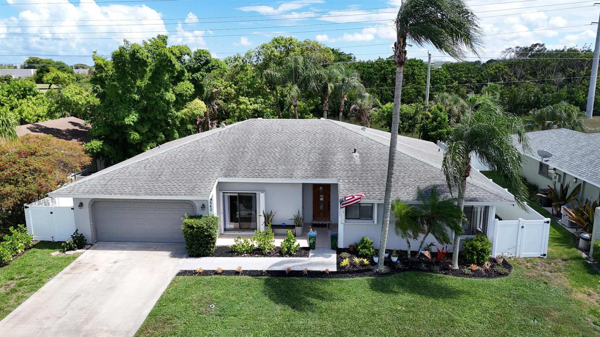 ROOF REPLACEMENT INCENTIVE OFFERED - ASK YOUR AGENT FOR DETAILS! Beautifully updated 3-bed, 2-bath plus bonus room with 2,000 sq ft in desirable Boca Raton. Fully renovated kitchen with cabinets galore and large capacity side-by-side refrigerator and freezer. Also enjoy both updated baths and floors, plus a modernized front exterior. Enjoy a spacious backyard with mango trees and no rear neighbors - perfect blank slate for a kids playset, pool, or even a she shed/man cave! New Bluetooth sprinkler system. Low HOA in sought after Pheasant Walk with kids play area and dock, located in an A-rated school district, close to shopping, dining, & with easy access to I-95 & the Turnpike. Move-in ready and just right to raise your family.