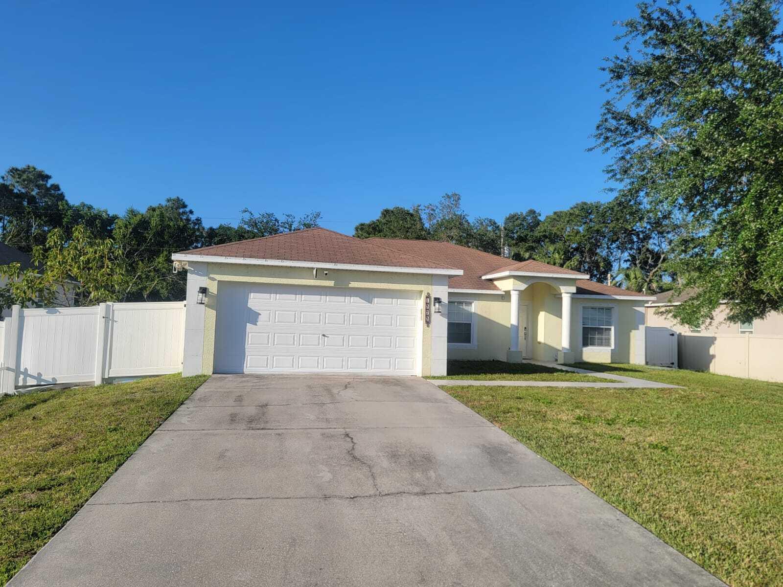 MOTIVATED SELLER....LOCATION, LOCATION, LOCATION! This charming 4-bedroom, 2-bath home is just what you've been searching for--perfectly nestled near the vibrant shops and restaurants of Tradition, all without the hassle of an HOA! Step inside to an open, sunlit space with soaring vaulted ceilings and a beautifully remodeled kitchen, complete with an eat-in area, tons of cabinetry, and sleek quartz countertops that make meal prep a joy. The spacious master suite invites you to unwind with dual sinks and a luxurious soaking tub, creating your own private retreat. You'll love the generous-sized bedrooms, indoor laundry room, and the privacy of a fully fenced backyard, perfect for family gatherings or a quiet evening outdoors.