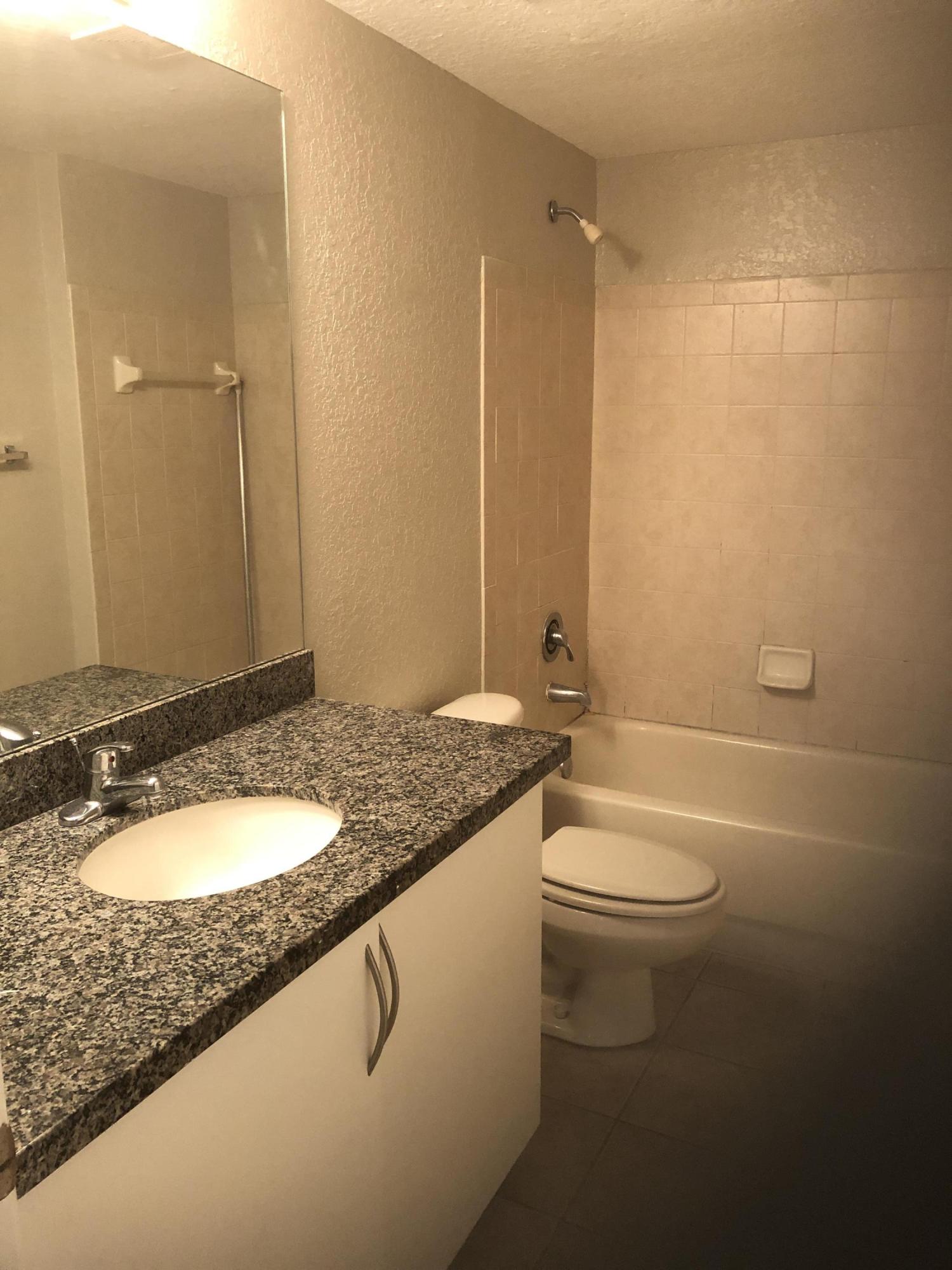 THE BELMONT AT ST LUCIE WEST, A CONDOMINIUM - Residential Lease