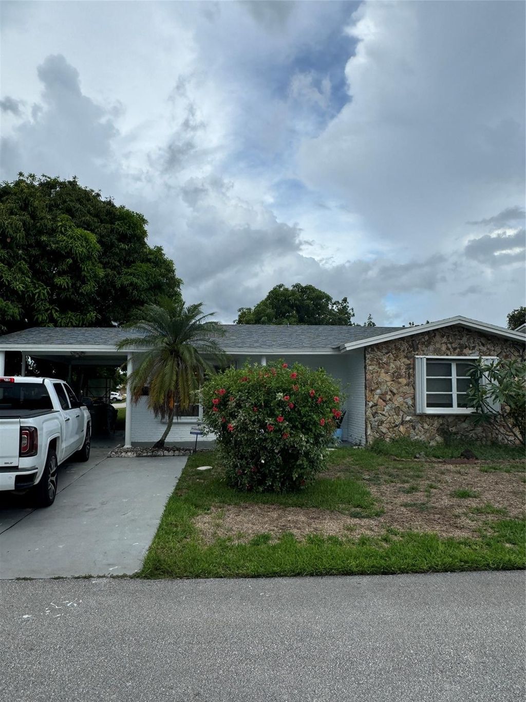 Photo of 5722 NW 65th Ter, Tamarac, FL 33321 (MLS # F10450081)