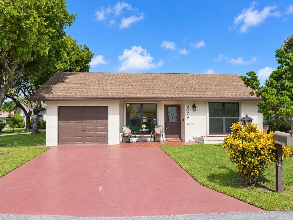 Photo of 2079 SW 16TH Circle, Deerfield Beach, FL 33442 (MLS # B26094527)
