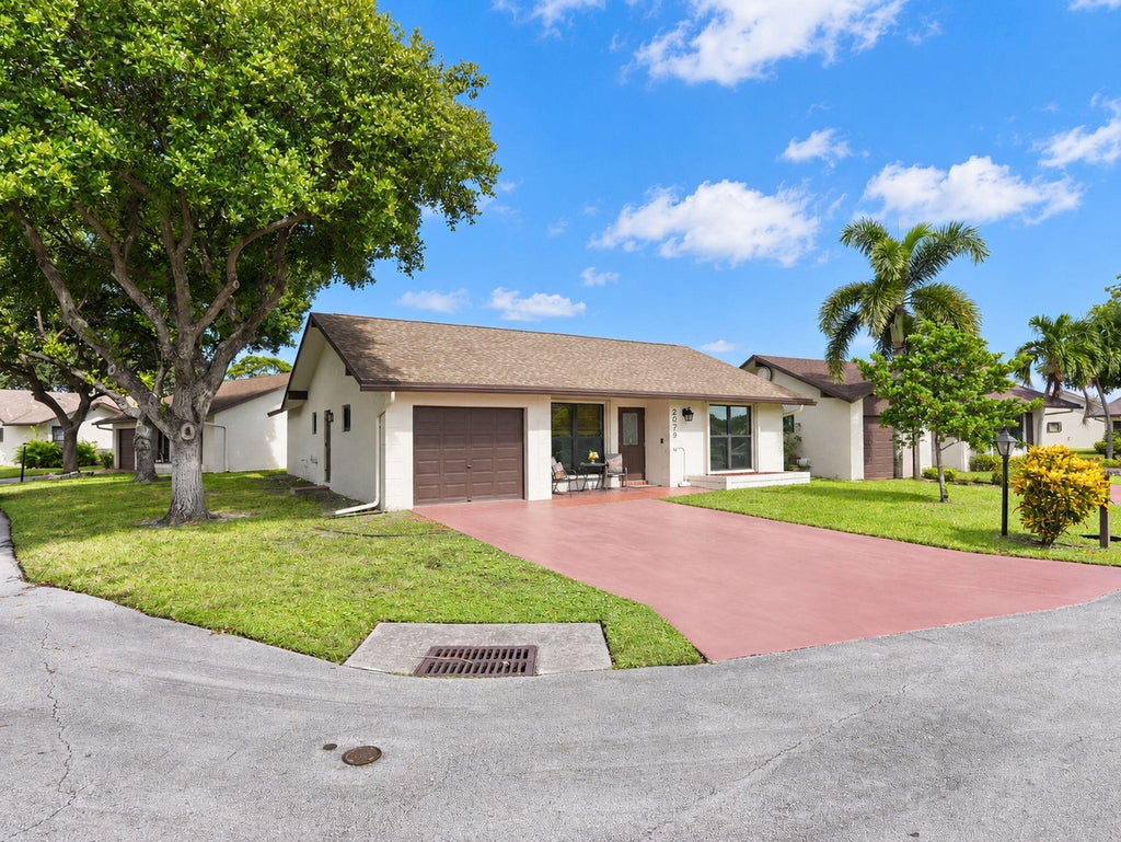 Photo of 2079 SW 16TH Circle, Deerfield Beach, FL 33442 (MLS # B26094527)