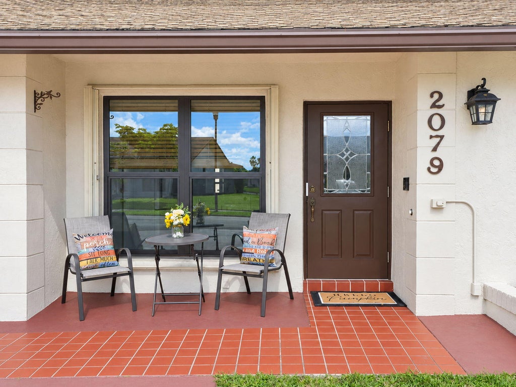 Photo of 2079 SW 16TH Circle, Deerfield Beach, FL 33442 (MLS # B26094527)