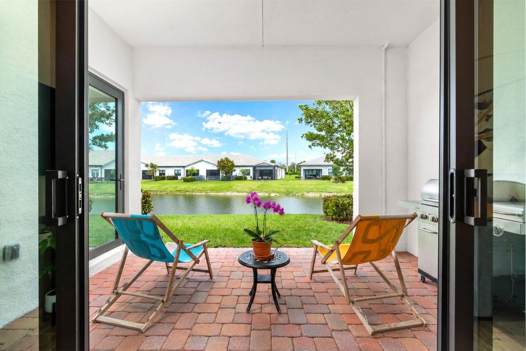 Photo of 7621 S Blue Spring Drive, Parkland, FL 33067 (MLS # B26018614)
