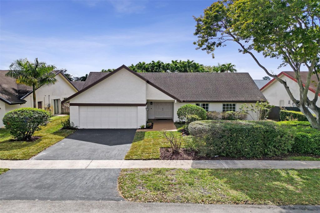 Photo of 10220 NW 25th Street, Pembroke Pines, FL 33026 (MLS # F10552734)