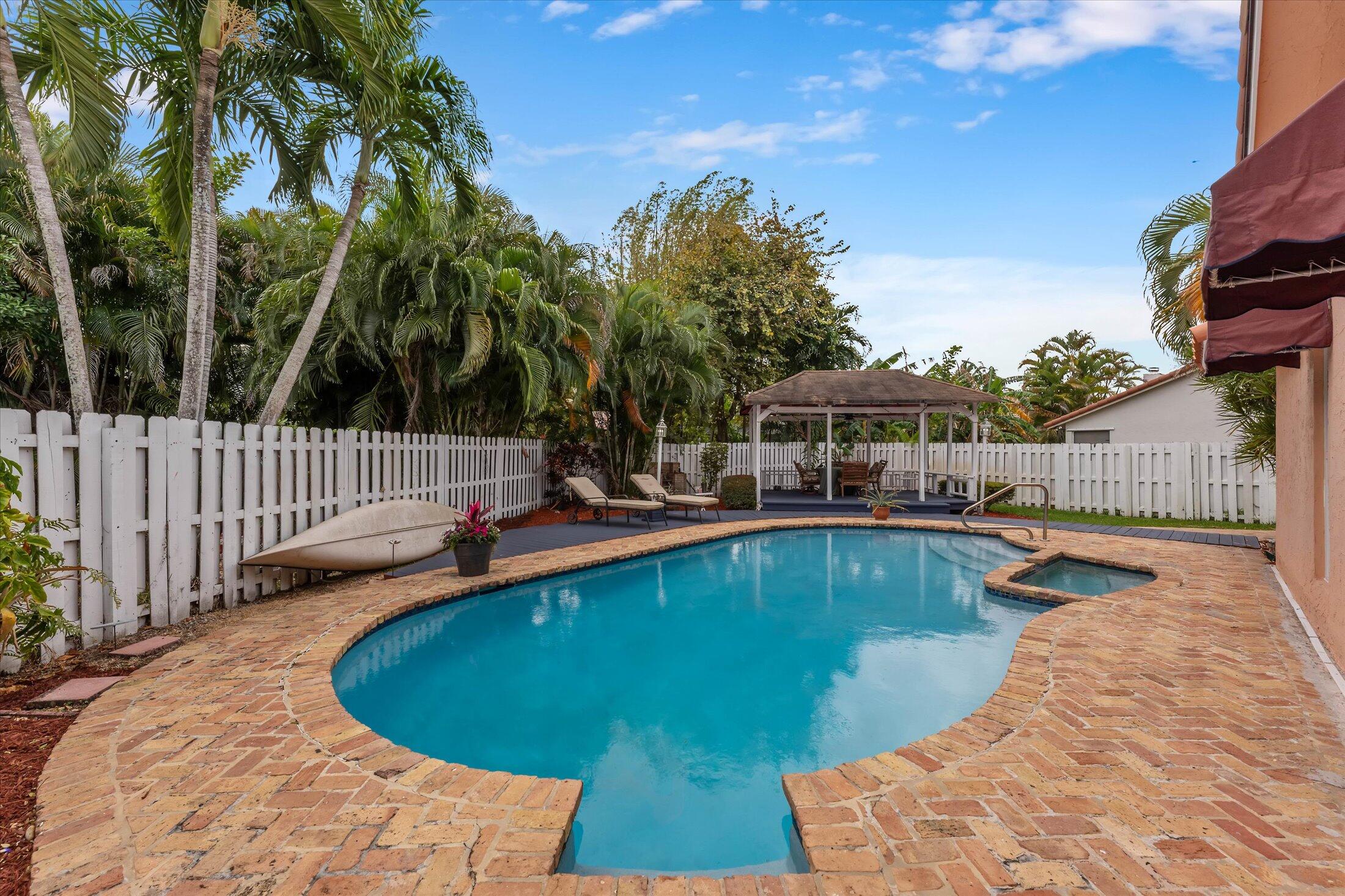 PLEASE READ! Due to the great responds from the buyers, is adjusted to $785,000, Seller will consider offers starting at $700,000This is not a formal auction, but a special campaign to generate strong buyer interest.Private Pool | All Impact Windows & Doors | Newer Roof, New AC & Heater | NO HOA | Cul-de-sac Location. Motivated seller invites you to discover this solid 4-bedroom, 2-bath pool home, ideally located on a cul-de-sac with no HOA. Well-maintained and move-in ready, the home features major upgrades including Full Impact Windows and Doors, a newer barrel tile roof, New AC, updated appliances, New electrical panel, and a Private Pool with vibrant Led lighting. Solid red brick construction, Pine wood accents, two cabana baths, one with Jacuzzi steam feature, and an