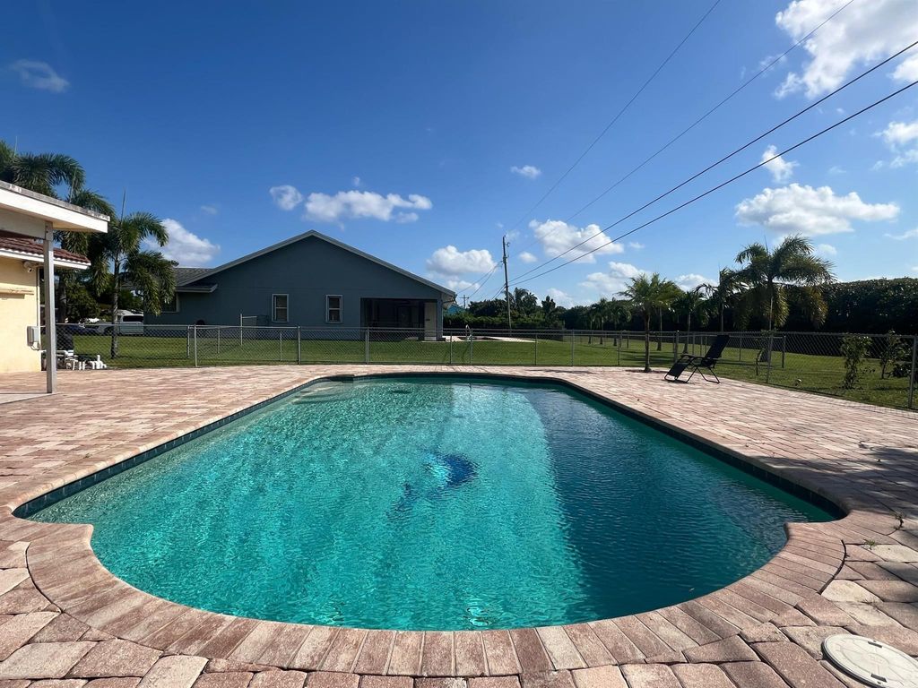 Photo of 224 Akron Road, Lake Worth, FL 33467 (MLS # R11121438)