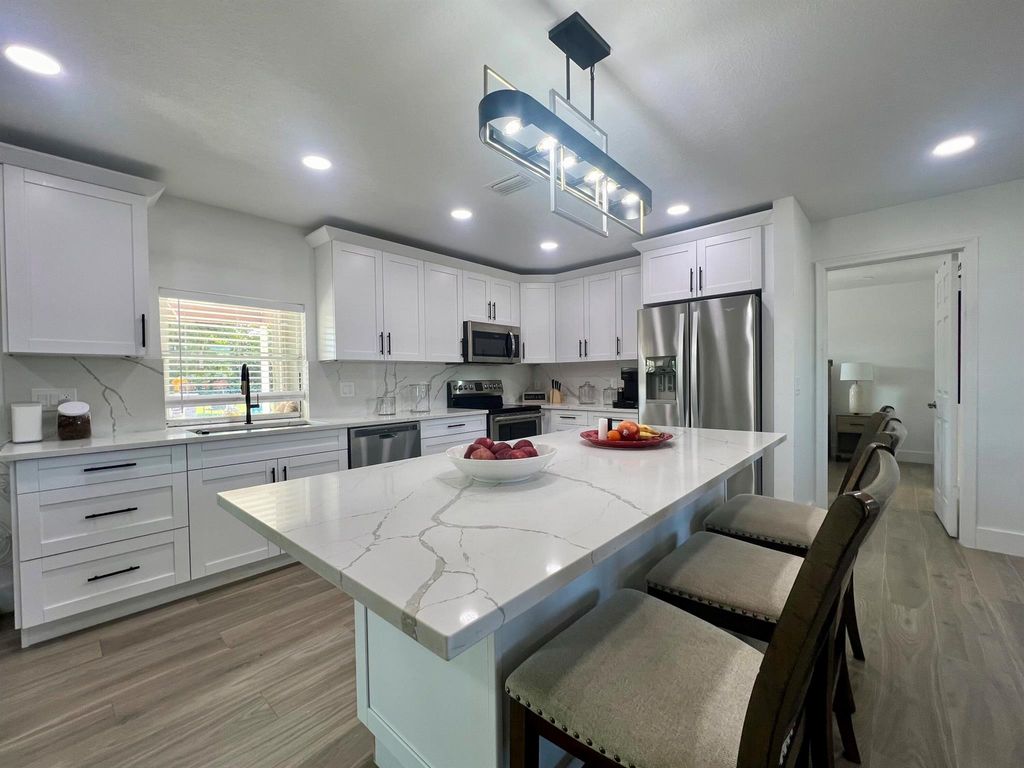 Photo of 224 Akron Road, Lake Worth, FL 33467 (MLS # R11121438)