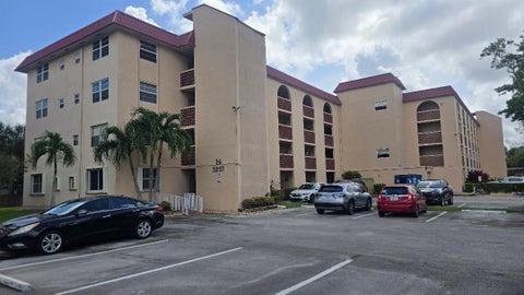 Photo of 3251 Holiday Springs Boulevard #302, Margate, FL 33063 (MLS # B26041611)