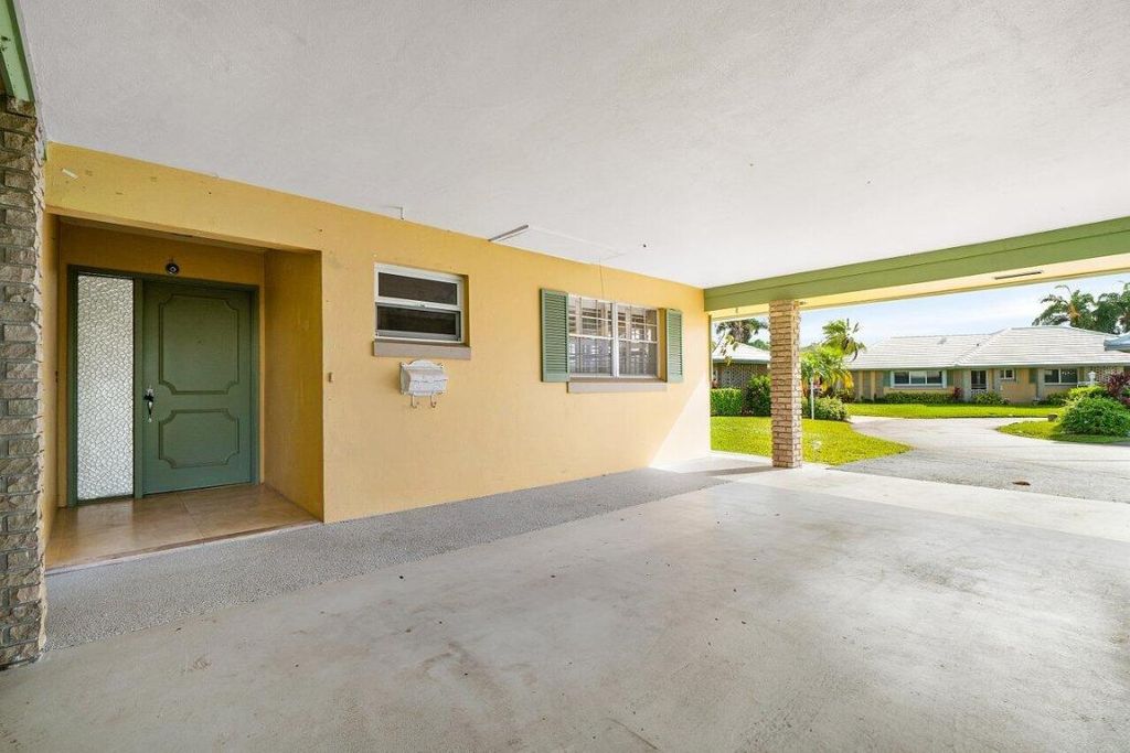 Photo of 362 Yorktowne Circle, Atlantis, FL 33462 (MLS # R11126845)
