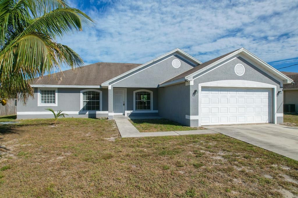 Photo of 3921 SW Mccrory Street, Port St Lucie, FL 34953 (MLS # R10875883)