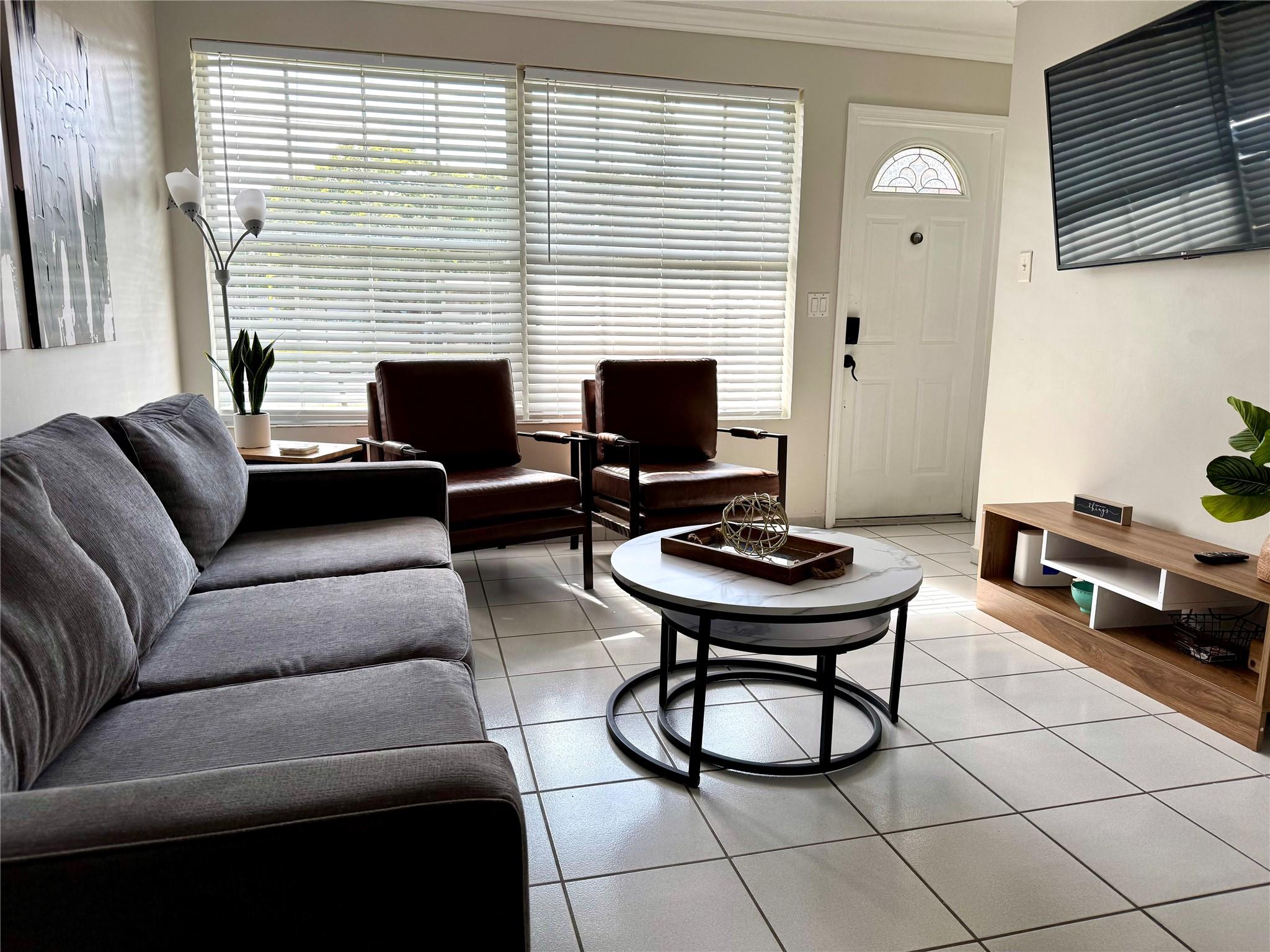 Call this cozy furnished apartment home. The apartment offers the perfect blend of comfort and convenience. The unit features 2 rooms (second room can be used as a bedroom or office/den/etc). Features a modern kitchen with sleek appliances and a beautifully renovated bathroom (1 bathroom). Step outside to a private patio area overlooking a serene, peaceful lake, with a large fenced-in backyard perfect for pets to roam. Located in a central area, you're just minutes away from I-95, Gulf Stream, Aventura Mall, lots of shops and restaurants, and beaches. Pets are allowed, unit is smoke-free. FREE Laundry room onsite. FREE parking for 2 cars. Perfect for singles/couples/traveling professionals/students. ASK ABOUT YEARLY OR UNFURNISHED OPTION!