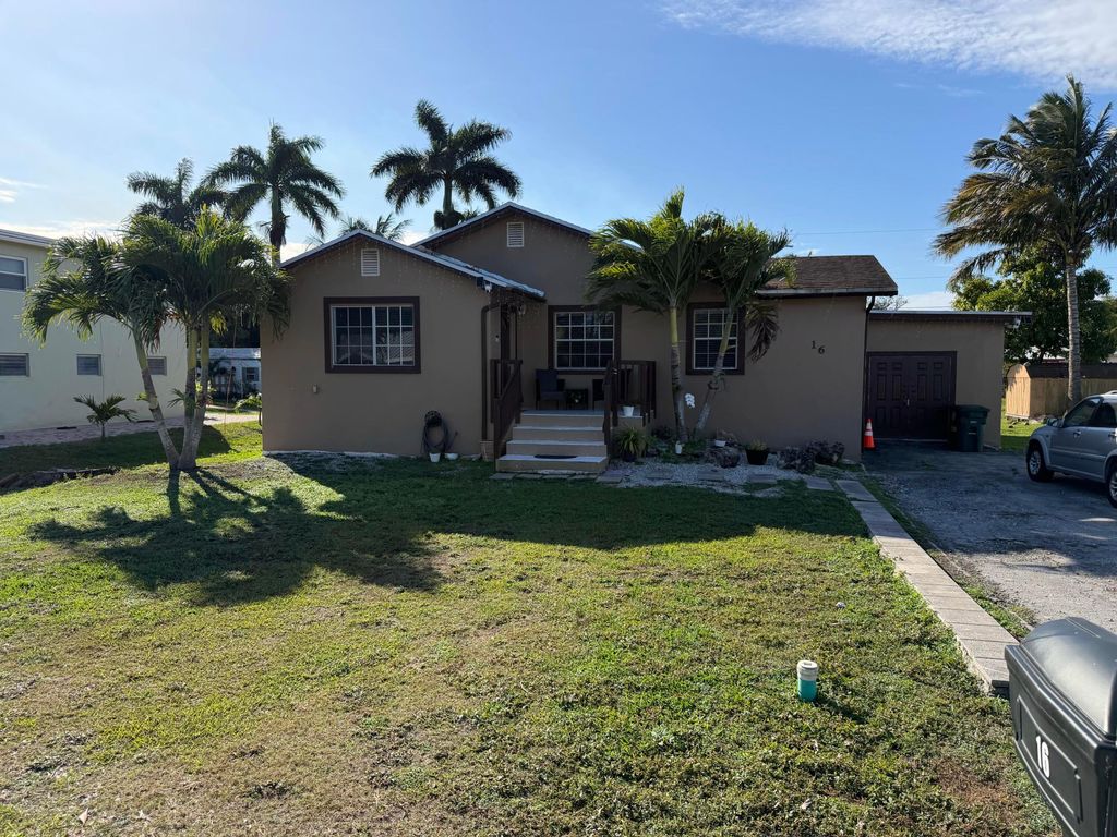 Photo of 16 NW Avenue G, Belle Glade, FL 33430 (MLS # R11159280)