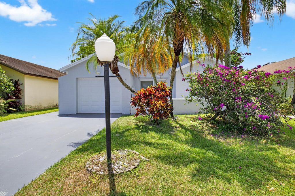 Photo of 9156 Pine Springs Drive, Boca Raton, FL 33428 (MLS # R11111239)