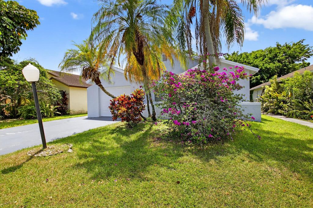 Photo of 9156 Pine Springs Drive, Boca Raton, FL 33428 (MLS # R11111239)