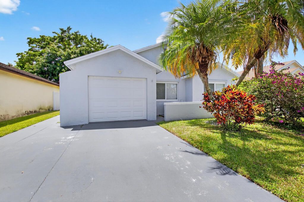 Photo of 9156 Pine Springs Drive, Boca Raton, FL 33428 (MLS # R11111239)