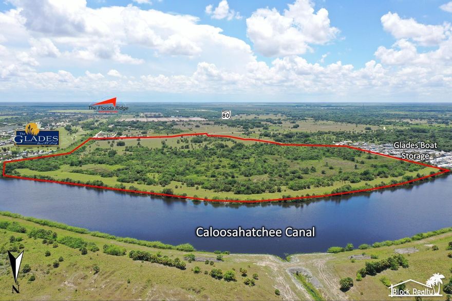 Partial Owner Financing Available with Exceptionally Low Interest Rates!!Introducing one of the largest and most prestigious remaining waterfront estates along the storied Caloosahatchee River. This remarkable 121.9-acre legacy property, showcasing approximately 3,000 feet of unobstructed water frontage, represents an extraordinary investment opportunity of unmatched scale and potential. With direct, deepwater access to both the Atlantic Ocean and the Gulf of Mexico, the site offers a breathtaking foundation for a luxury residential enclave, world-class RV resort, premier marina, or iconic mixed-use development. Commandingly positioned between Glades Boat Storage & Boatyard to the west and Glades RV Resort, Golf & Marina to the east, the property is currently zoned AG/Res yet offers