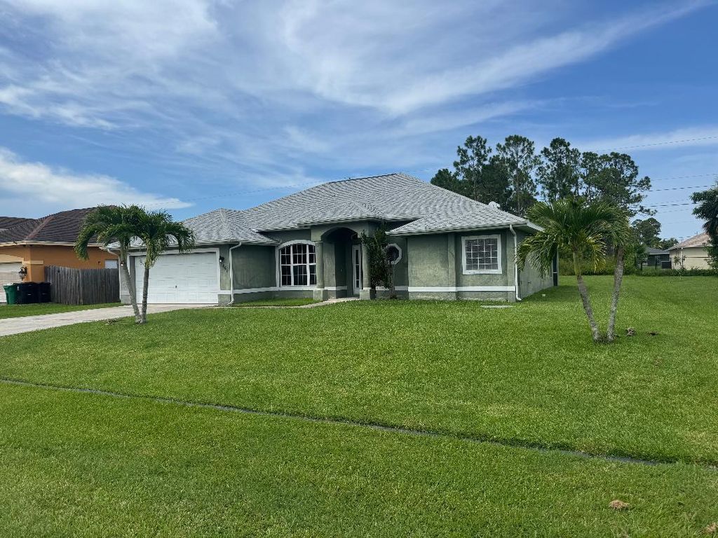 Photo of 2461 SW Webster Lane, Port St Lucie, FL 34953 (MLS # R11108878)