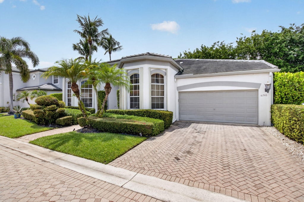 Photo of 6295 NW 43RD Terrace, Boca Raton, FL 33496 (MLS # B26067486)