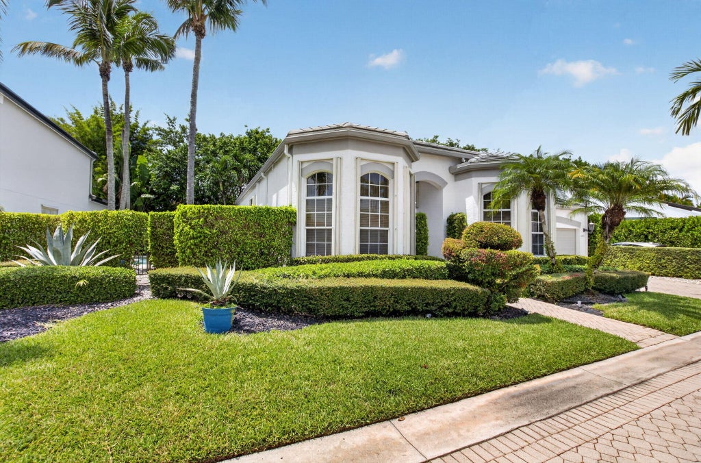 Photo of 6295 NW 43RD Terrace, Boca Raton, FL 33496 (MLS # B26067486)