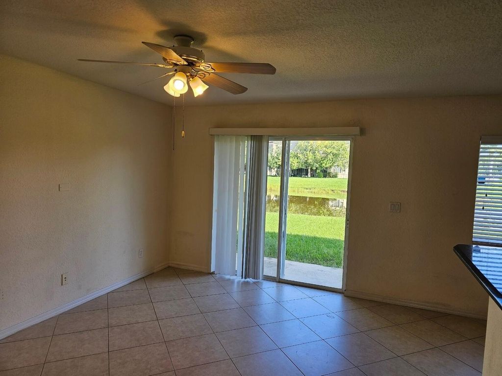 Photo of 2205 SW Rockport Road, Port Saint Lucie, FL 34953 (MLS # R11025155)