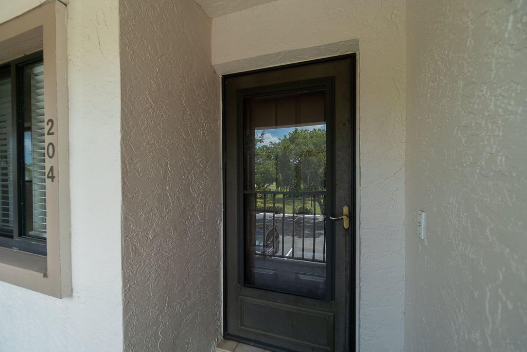 Photo of 1141 Duncan Circle #204, Palm Beach Gardens, FL 33418 (MLS # R11007925)