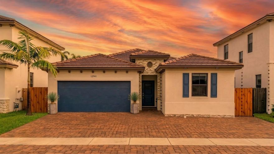 Rare private lot with no rear neighbors, backing to a quiet street buffer that provides added privacy and natural light. Built in 2022, this 4-bedroom, 3-bath single-story home features an open Great Room layout with ceramic tile flooring throughout. The owner's suite includes custom ceiling details and a spacious bathroom. The kitchen includes 36' cabinetry, stainless steel appliances, and generous storage. Additional features include a two-car garage, extended driveway, and rear access entry. Located in a quiet residential setting with convenient access to shopping, dining, and major roadways.