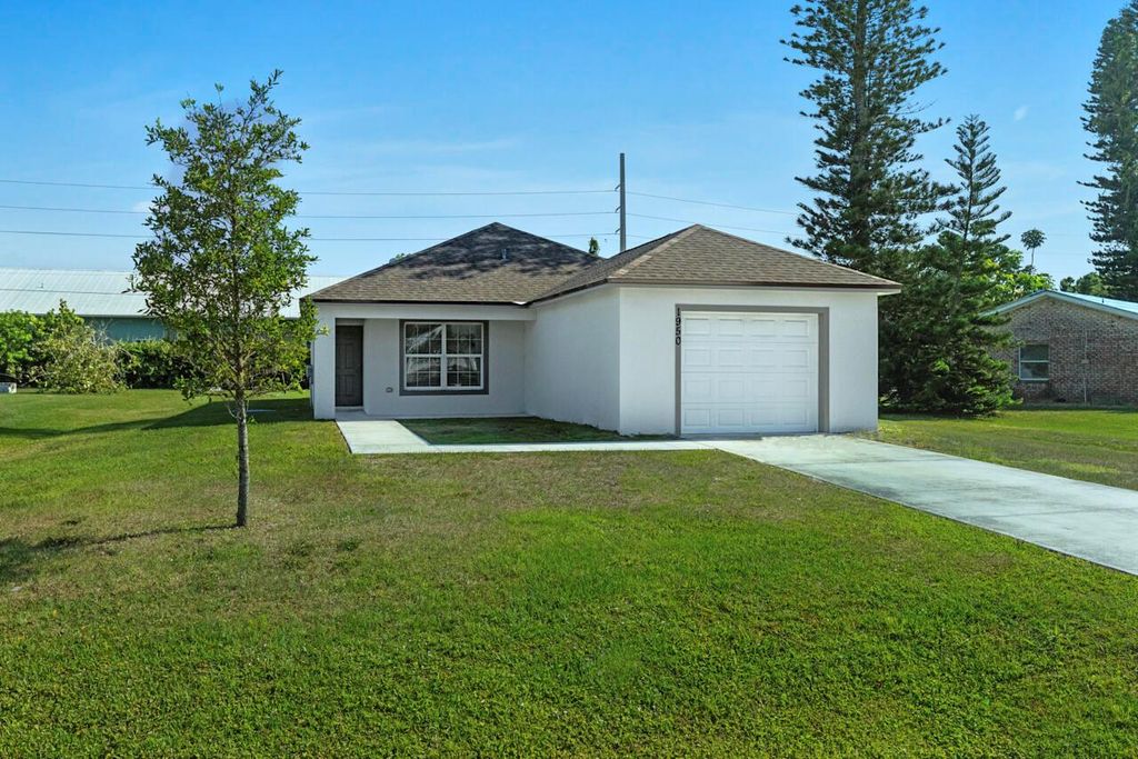 Photo of 1950 SE Gena Road, Port Saint Lucie, FL 34952 (MLS # R11083339)