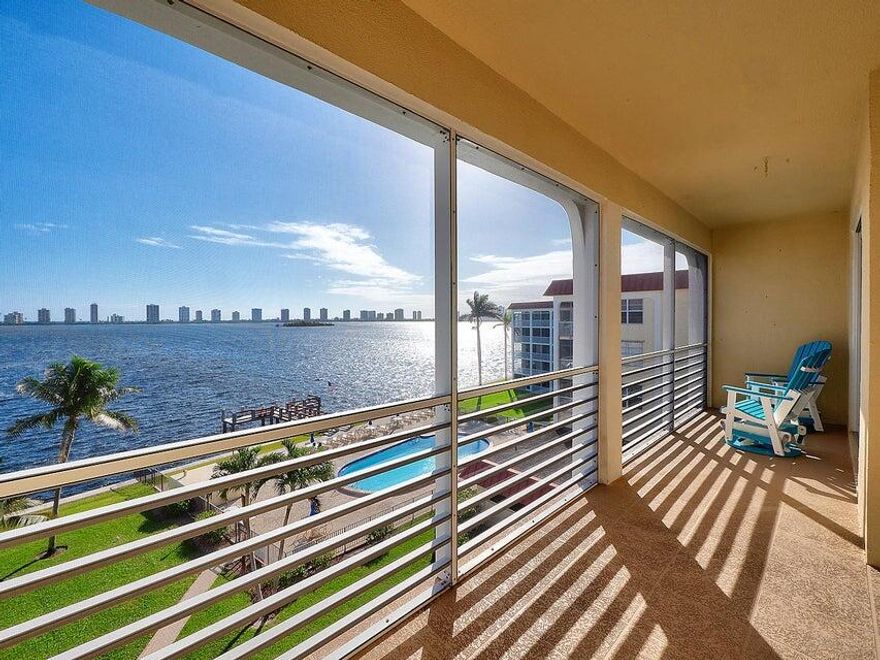 COMPLETELY REMODELED 2/2 UNIT.  Highest Quality Finishes with attention to detail throughout.  Top Floor, Middle unit offers Panoramic Water Views of the widest part of the Intracoastal. Screened outdoor living area.   The most amazing views from the 25 foot balcony.  Impact glass, ceiling fans, porcelain wood like floors, custom kitchen open to living area with Sub Zero Fridge/Freezer drawers.  Wood Cabinets, Pendent Lightings, Shiplap ceiling with added High Hats.  Double vanities in Master Bath with large marble walk in shower.  ToTo Toilets, custom Closets, 2nd Bath with Deco Shower inlays, Solid Interior Doors, Storage, Great Natural light, close to Golf/Tennis.  Furniture negotiable.  For additional information, please see Paradise Harbour Rules and Regulations provided in Documents. Plantation shutters on the windows.  Association Amenities include Billiard Room, Clubhouse, Fitness Center.