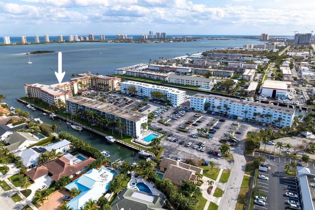 Photo of 105 Paradise Harbour Boulevard #502, North Palm Beach, FL 33408 (MLS # B26014830)