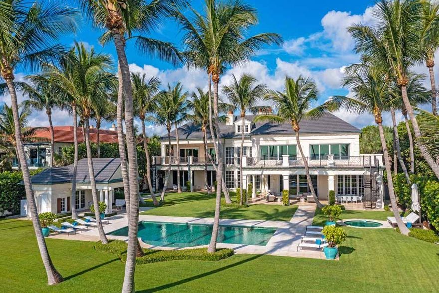 Stunning ocean views provide the perfect backdrop for this opulent oceanfront estate located in Delray's Estate Section. Boasting 125' of direct oceanfrontage on over 1.3 acres, the gated compound provides abundant privacy. Built to the highest standards, the five bedroom residence offers formal living areas with ocean views; wine room; stately office; media room; first floor master wing with oceanside terrace; second floor VIP suite; three additional guest rooms; gym; bonus room; and three garages to accommodate 12 cars. There is plenty of room for outdoor living with covered loggia; manicured grounds; pool and separate spa; pool house with full bath; and private path through the dune to the beach. Offered fully furnished, this oceanfront compound invites the very best in luxury living. FEATURES
*125 feet of direct oceanfrontage
*Over 1.3 acres in Delray Beach Estate Section with high elevation for grand ocean views
*Offered fully furnished; turn-key
*5 bedrooms / 8.2 baths
*19,941 square feet under air / 25,319 total square feet
*Gated compound with decorative motor court and separate gate with access to lower level garage
*Palm Beach style estate grounds with classic front entry
*Foyer provides first glimpse of elegant interior, manicured grounds and picturesque ocean vistas
*Volume ceilings, grand staircase and powder room off foyer
*Living room with fireplace and access to covered loggia, grounds and ocean views
*Formal dining room with nearby wine room, butler's pantry and gourmet kitchen
*Family room with fireplace, wet bar and access to outdoor loggia
*Gourmet kitchen with large island; top-of-the-line appliances; pantry; seaside breakfast area; pantry; and access to butler's pantry and formal dining room
*Paneled office with fireplace
*First floor master wing with sitting room; spacious bedroom with terrace; dressing area with morning bar; two separate master baths with spacious walk-in closets; interior spiral staircase to media room; exterior spiral staircase to balcony
*Service hallway with elevator; powder room; full laundry room; secondary staircase to lower and upper levels; and access to main level garage
*Second floor landing with views of the ocean, grounds and interior living areas
*Media room with comfortable couches, built-ins and room to entertain or relax
*VIP Suite with spacious balcony; sitting room with morning bar; and large bath
*Three additional en suite guest rooms
*Gym
*North hallway to gym; fully laundry room; elevator and top floor
*Top floor bonus room could serve as multi-purpose function
*Professionally landscaped grounds with spectacular ocean views
*Covered loggia with ample space for outdoor dining and living area overlooking the ocean
*Oceanside pool with separate spa 
*Pool house with full bath
*Private path through dune to beach and ocean
*North gated service entrance leads to lower parking garage with room for 8 cars
*Lower level with mechanical room; generator; access to parking garage; full bath; and stairway access to main floor
*Impact windows and doors; full house generator; Crestron technology; and multi-zone ac's

This oceanfront compound is offered fully furnished to provide the very best in luxury living.