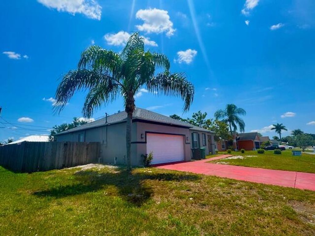 Photo of 792 SW Nichols Terrace, Port Saint Lucie, FL 34953 (MLS # R11061073)