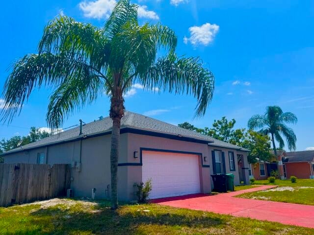Photo of 792 SW Nichols Terrace, Port Saint Lucie, FL 34953 (MLS # R11061073)