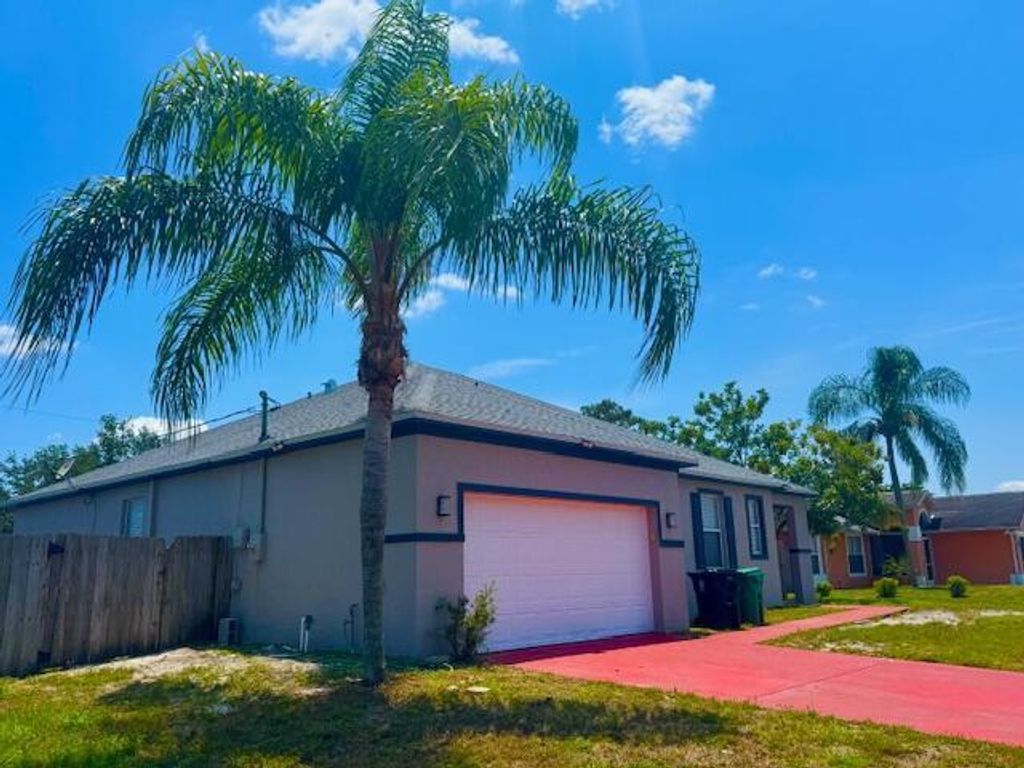 Photo of 792 SW Nichols Terrace, Port Saint Lucie, FL 34953 (MLS # R11061073)