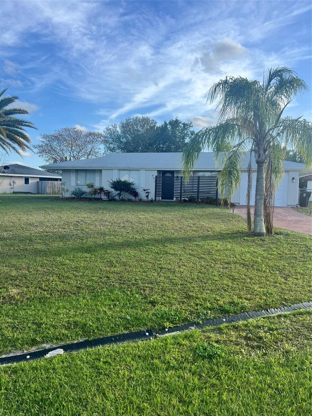 Photo of 402 SW College Park Road, Port Saint Lucie, FL 34953 (MLS # F10428454)