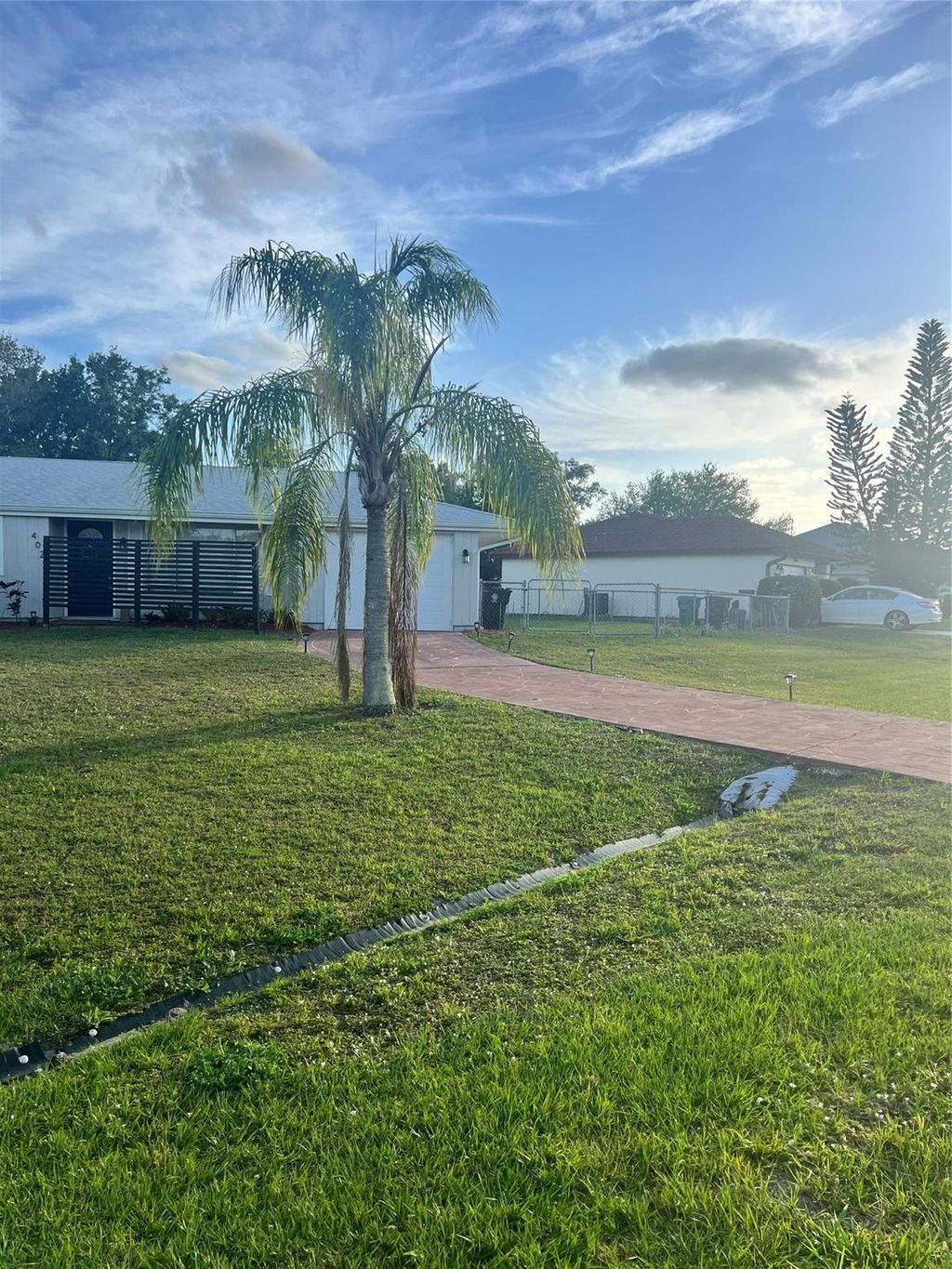 Photo of 402 SW College Park Road, Port Saint Lucie, FL 34953 (MLS # F10428454)