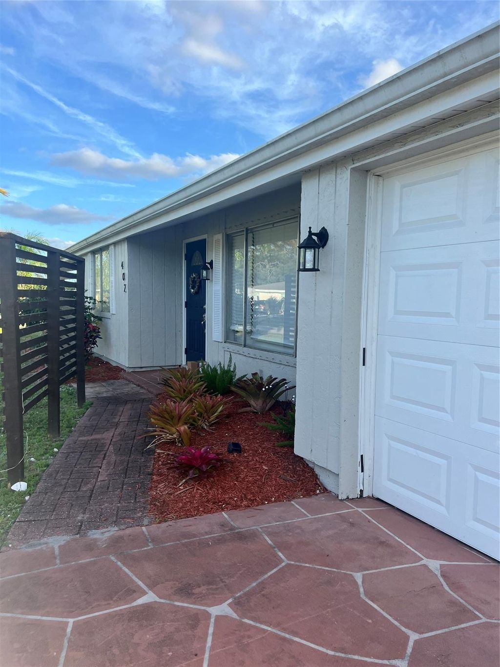 Photo of 402 SW College Park Road, Port Saint Lucie, FL 34953 (MLS # F10428454)