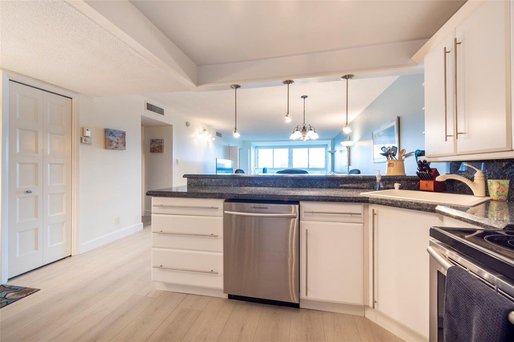 Photo of 3051 N Course Drive #802, Pompano Beach, FL 33069 (MLS # F10407843)