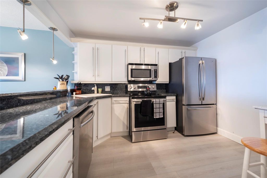 Photo of 3051 N Course Drive #802, Pompano Beach, FL 33069 (MLS # F10407843)