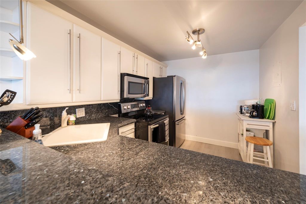 Photo of 3051 N Course Drive #802, Pompano Beach, FL 33069 (MLS # F10407843)