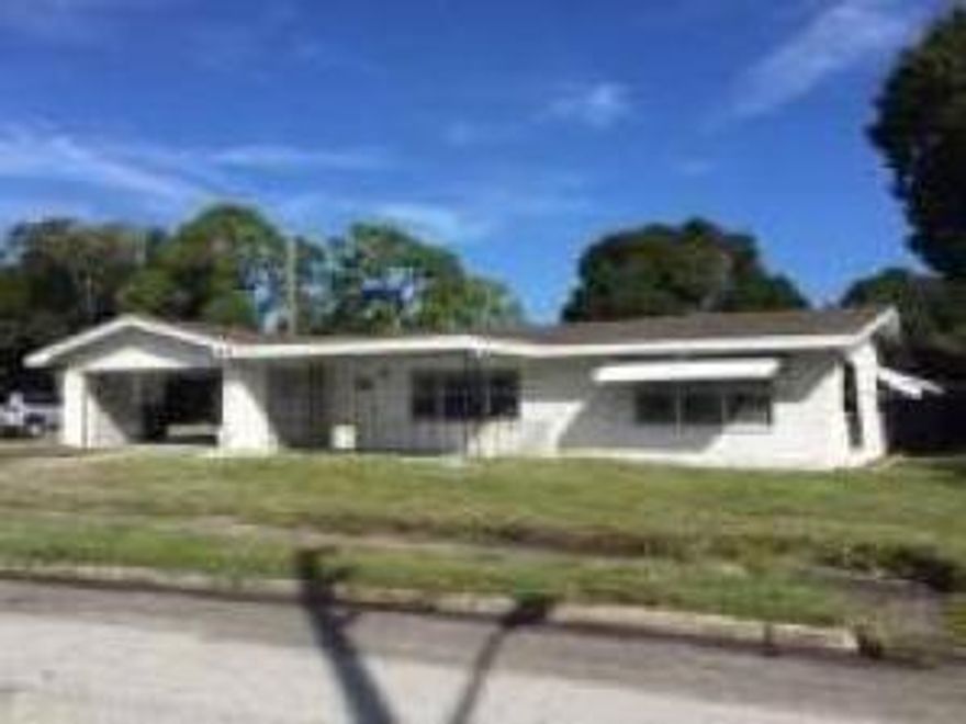 SOLID 3 BEDROOM 2 BATH CBS HOME LOCATED CENTRALLY TO SHOPS BEACHES AND HIGHWAYS. THIS HOME IS MOVE IN READY. ALSO HAS 2 utility rooms, and enclosed built in Florida room.