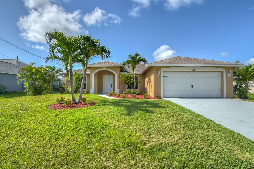 Photo of 400 SW Ridgecrest Drive Dr, Port St Lucie, FL 34953 (MLS # R10820903)