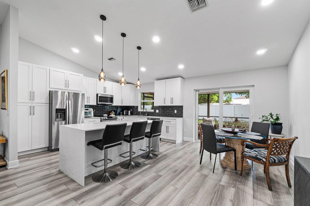 Photo of 981 Wynndale Way, Lantana, FL 33462 (MLS # R11106787)